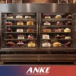 Cream cakes drying out inside a commercial cake display chiller because of strong airflow and low temperature control
