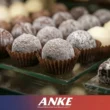 Chocolate bloom on truffles in a commercial chocolate display cabinet caused by poor temperature and humidity control