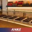 Chocolate display cabinet cost in Dubai with custom glass counter by ANKE International