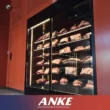 ANKE upright commercial meat display with modular shelving maximizes merchandising capacity for packaged fresh meat in Dubai butcheries.